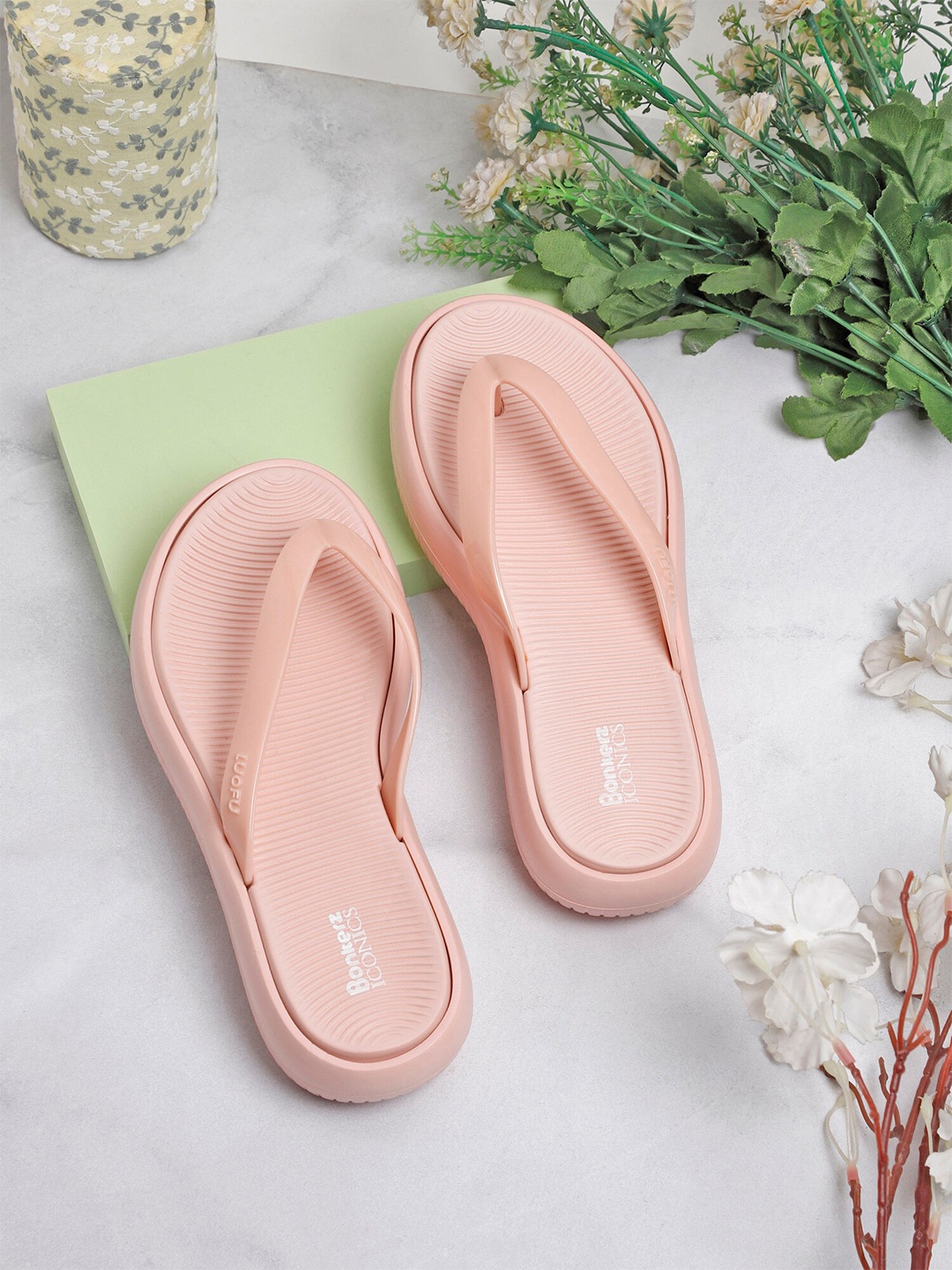 

ICONICS Women Peach-Coloured Croslite Thong Flip-Flops