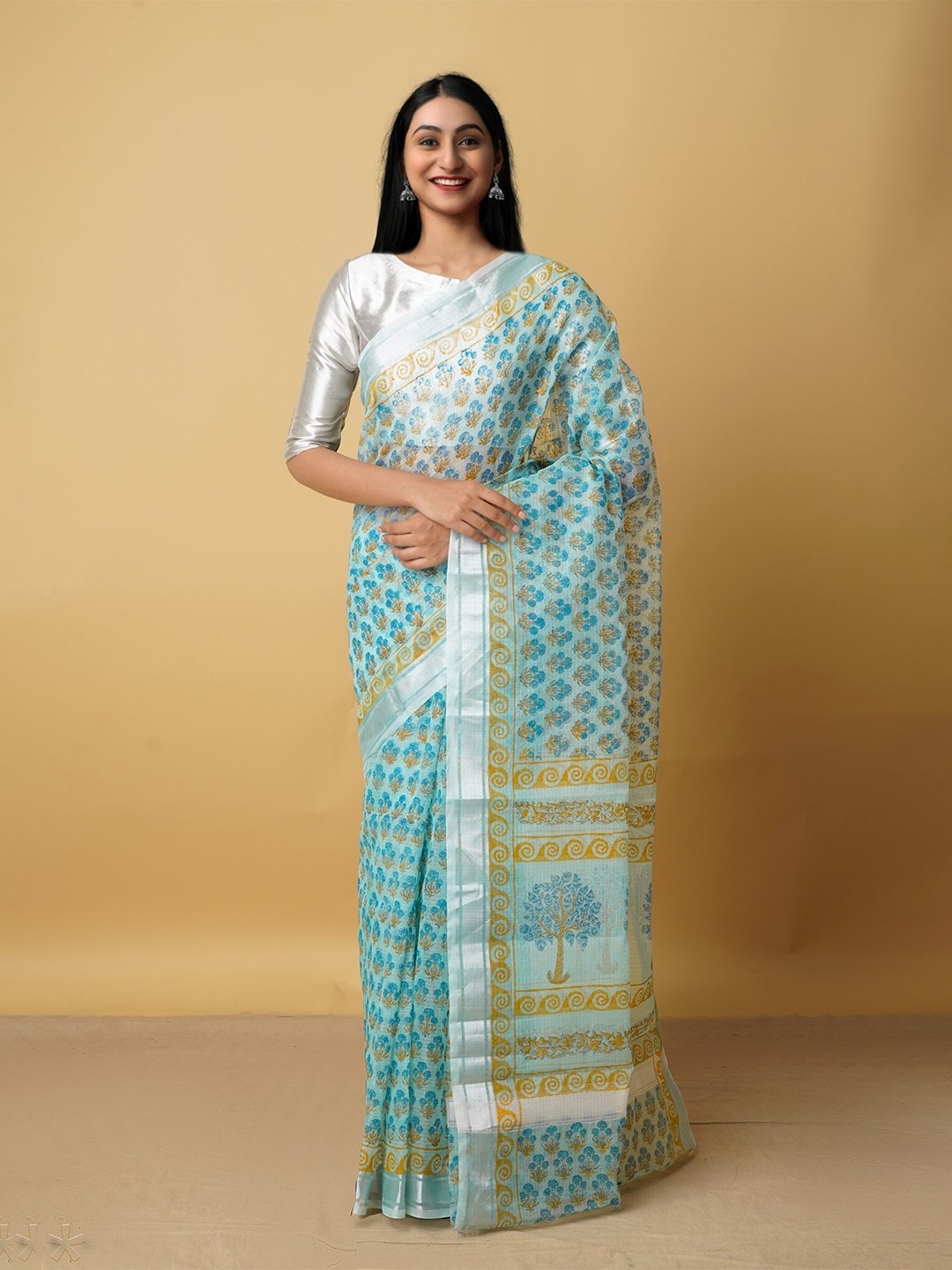 

Unnati Silks Blue & Brown Ethnic Motifs Zari Pure Cotton Kota Saree
