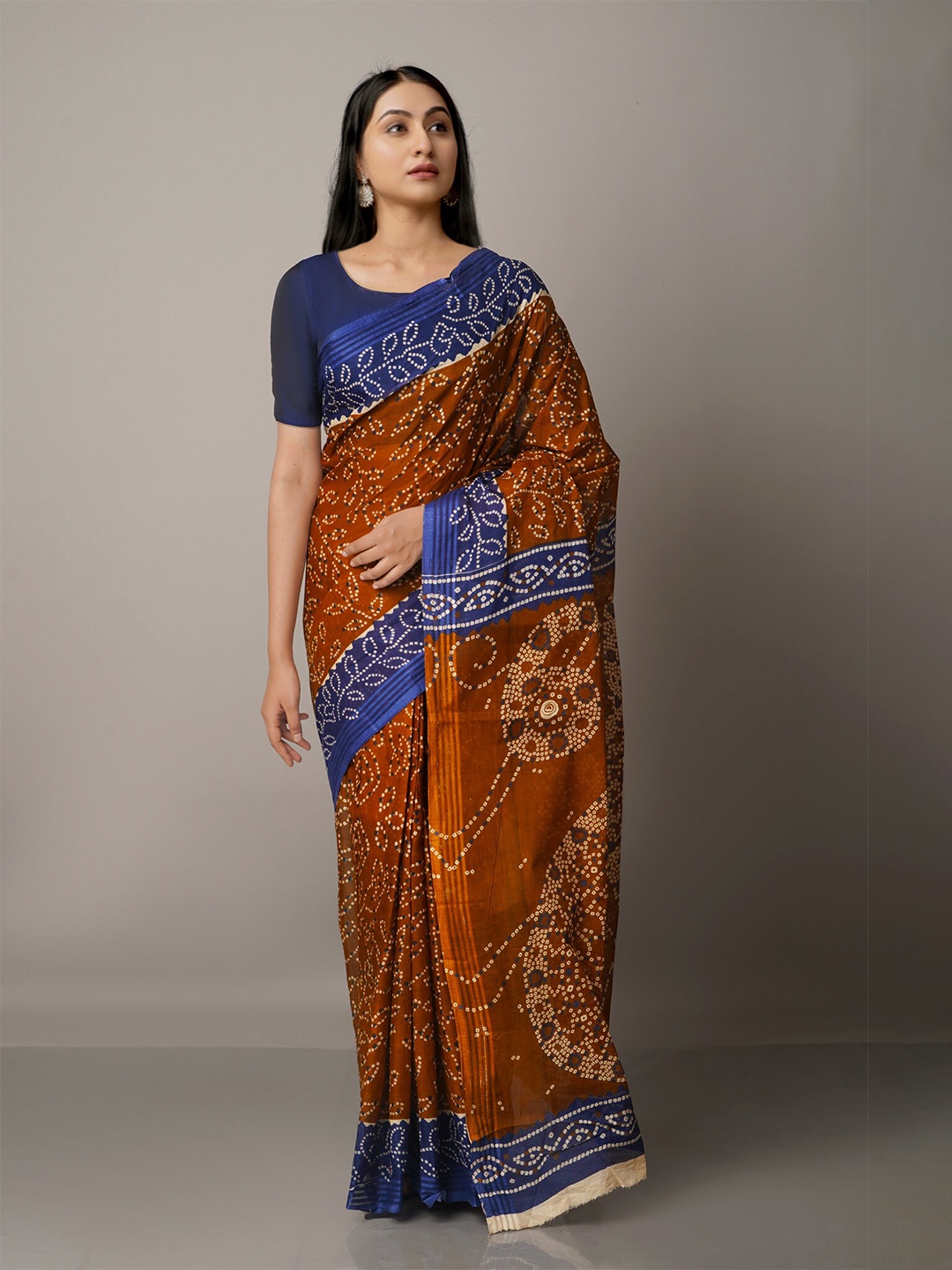 

Unnati Silks Brown & Blue Ethnic Motifs Pure Cotton Kovai Saree