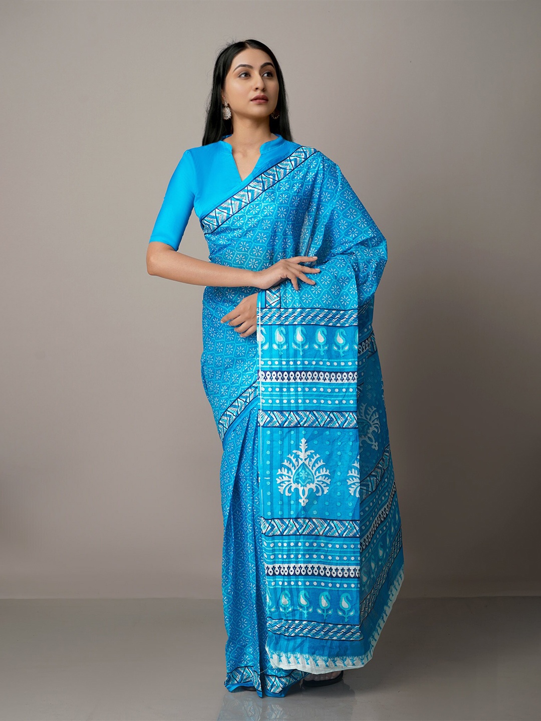 

Unnati Silks Blue & White Ethnic Motifs Pure Cotton Kovai Saree
