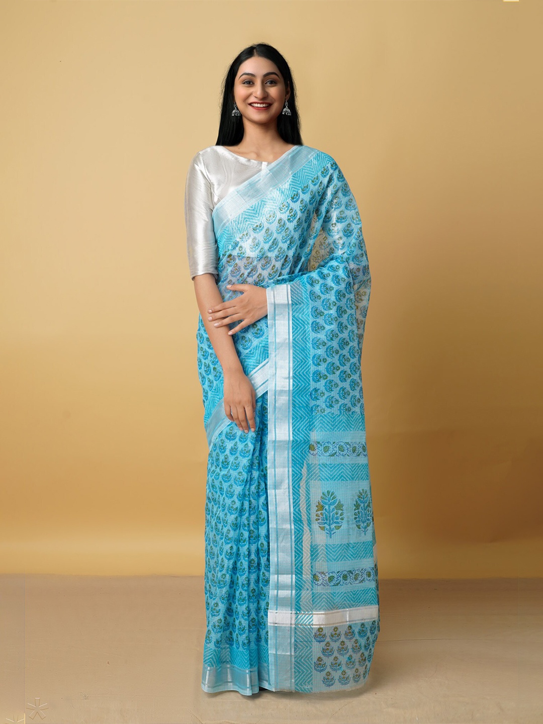 

Unnati Silks Blue & Green Ethnic Motifs Zari Pure Cotton Kota Saree