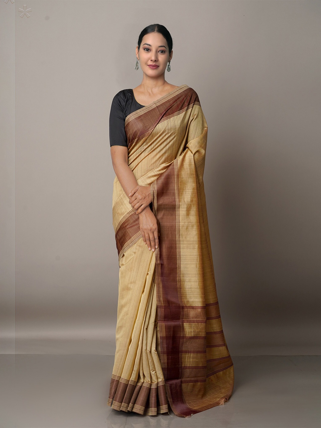 

Unnati Silks Beige & Brown Art Silk Patola Saree