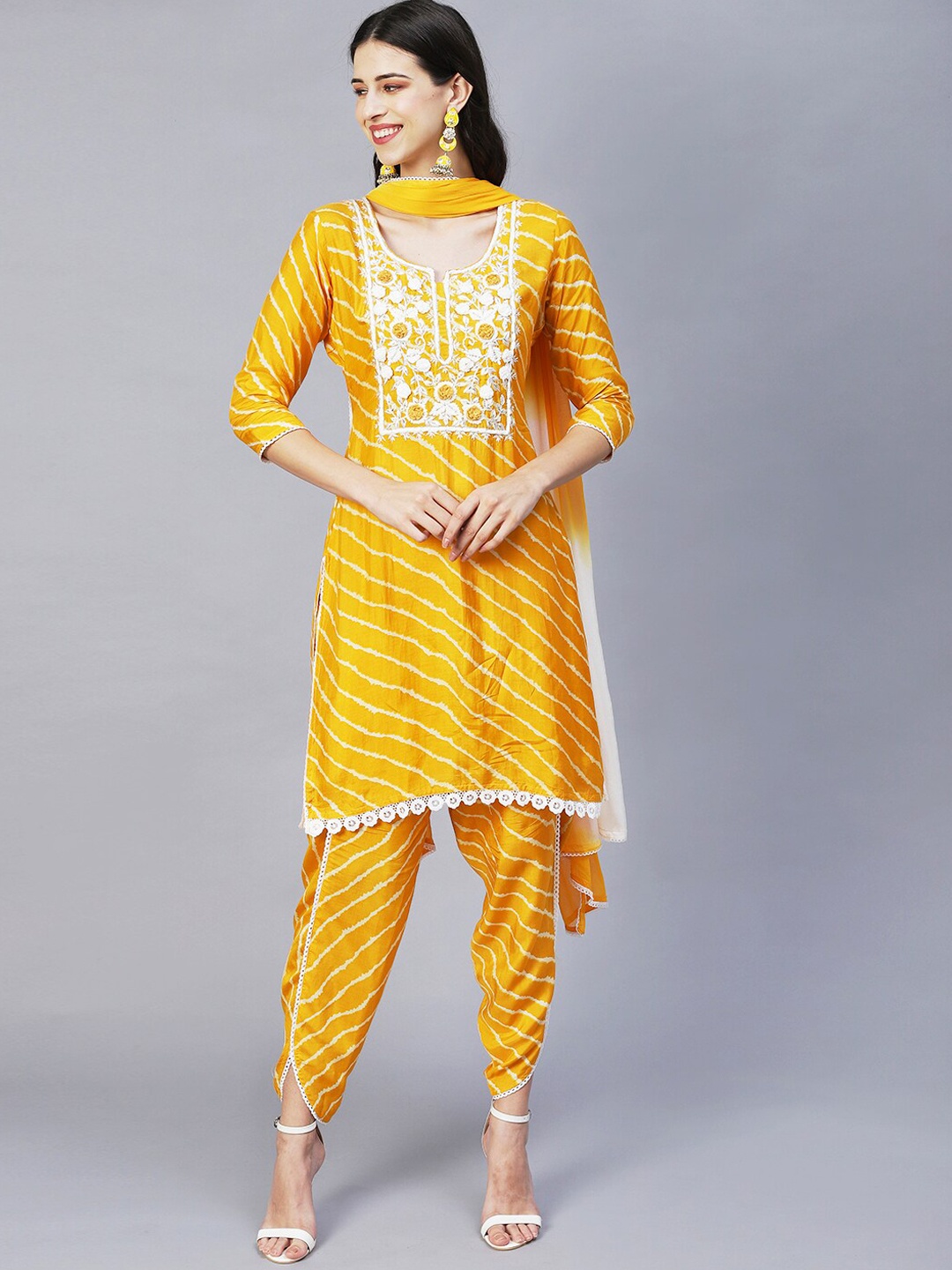 

FASHOR Women Yellow Leheriya Printed Thread Work Kurta with Dhoti Pants & With Dupatta