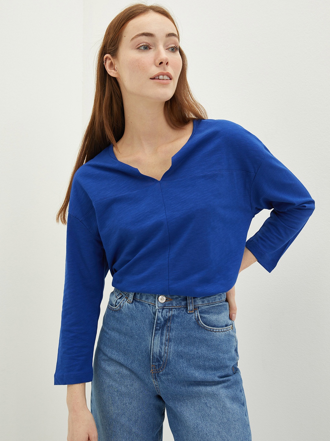 

LC Waikiki Blue Solid Cotton Extended Sleeves Blouson Top