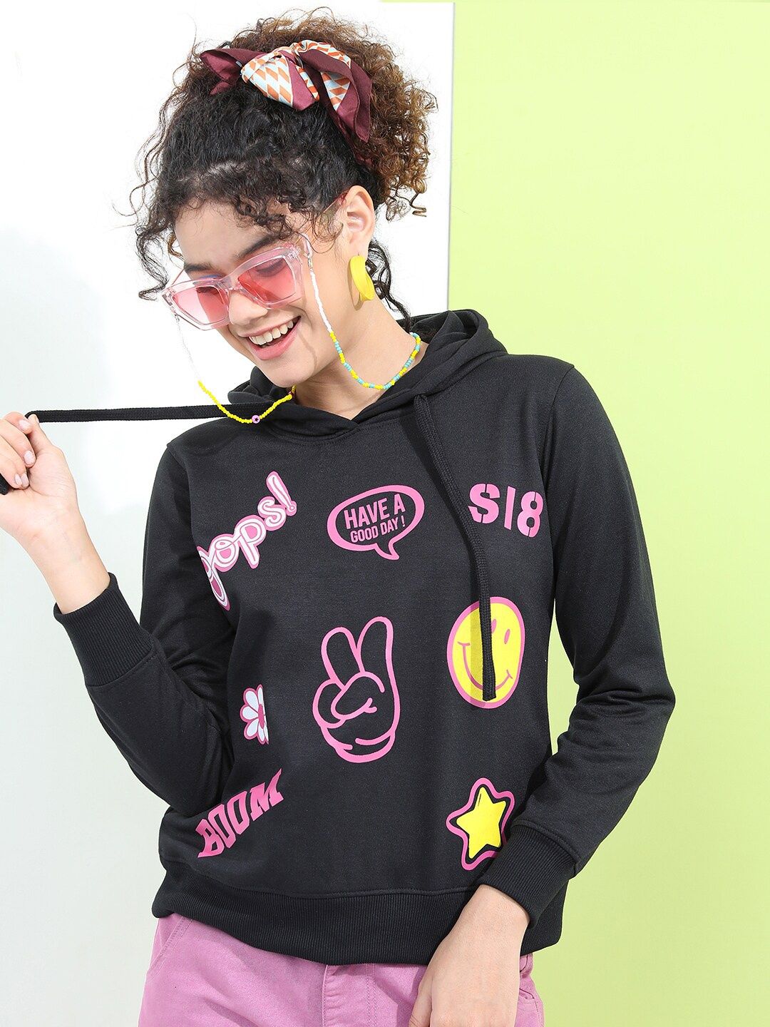 

Tokyo Talkies Women Black Printed Hooded Sweatshirt