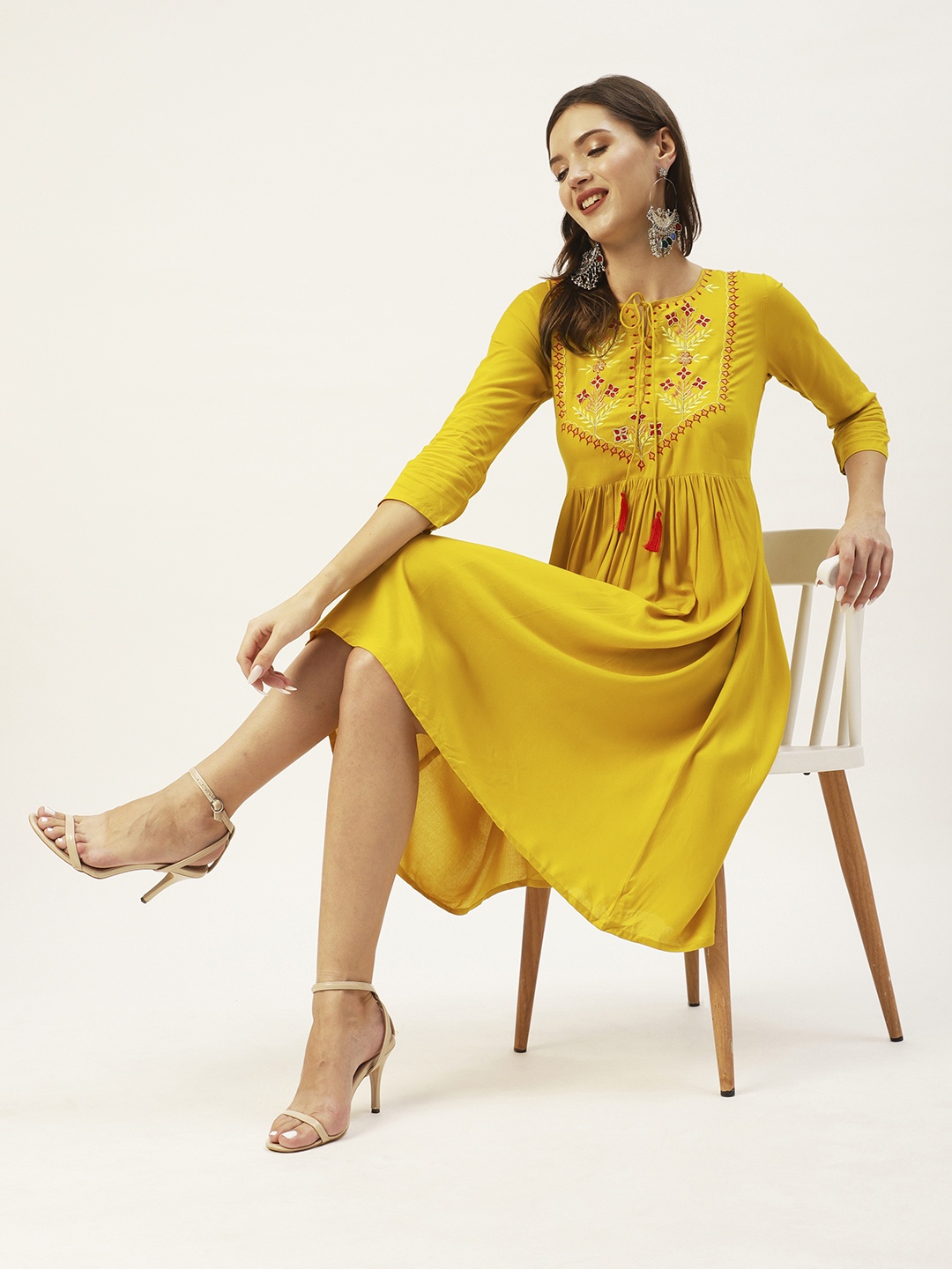 

Anubhutee Women Yellow Ethnic Motifs Embroidered Tie-Up Neck Dress