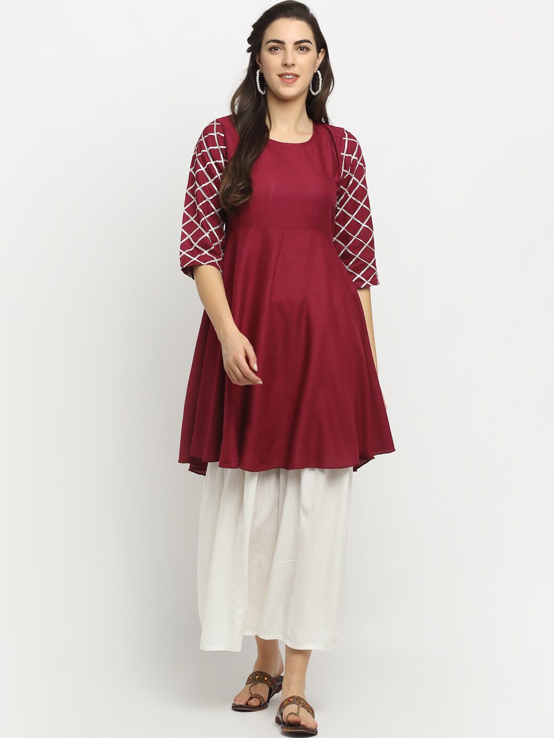 

Rudra Bazaar Women Maroon Kurta with Sharara