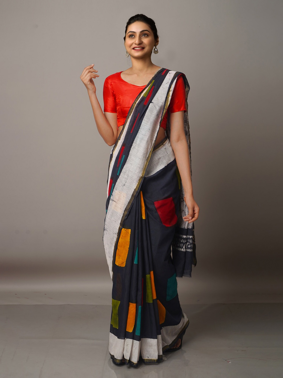 

Unnati Silks Black & Orange Batik Silk Cotton Chanderi Saree