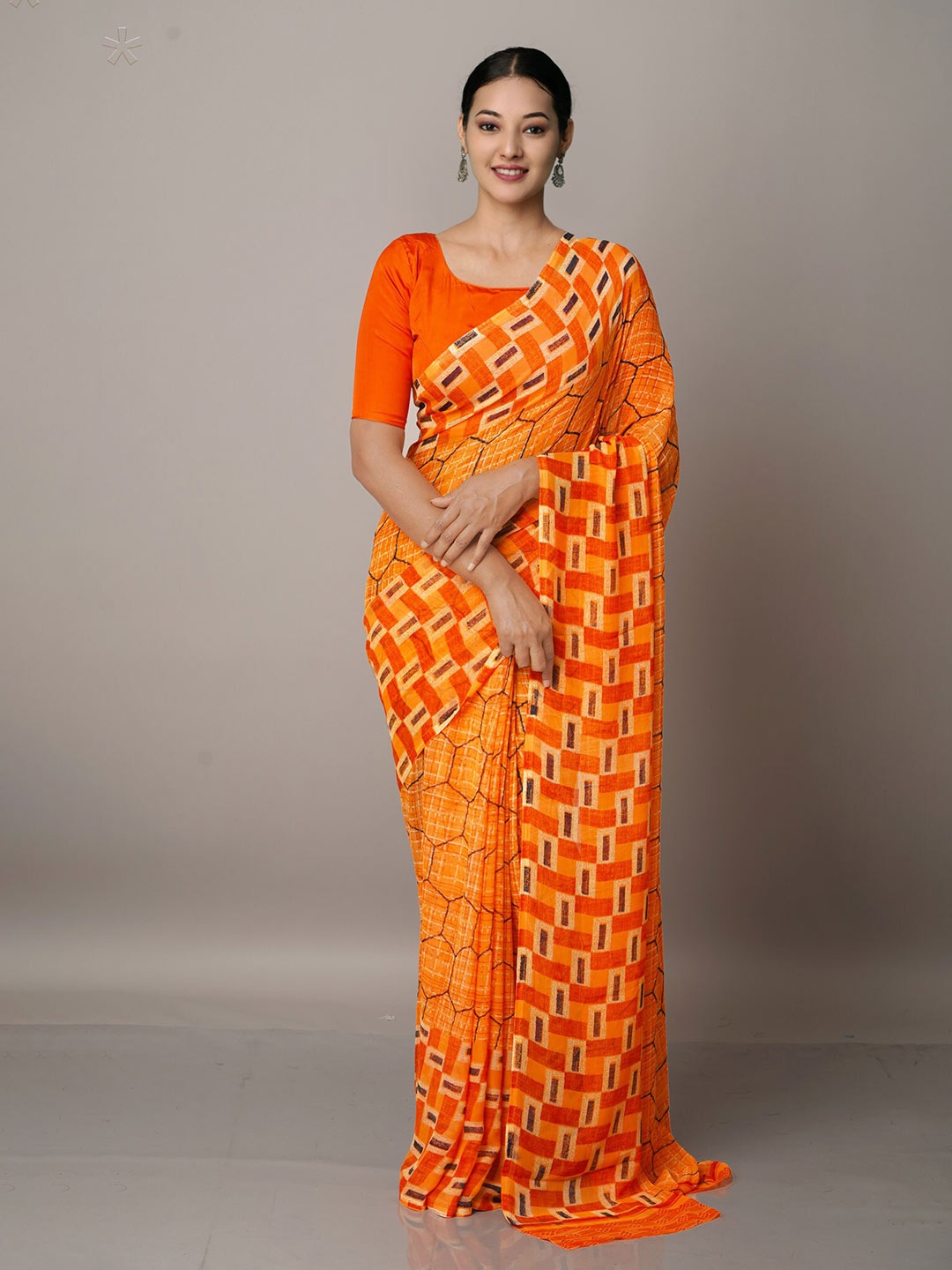 

Unnati Silks Orange & Brown Block Print Saree