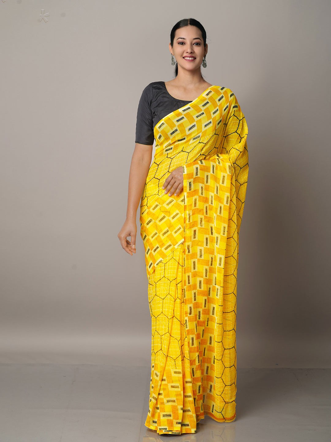 

Unnati Silks Yellow & Black Block Print Saree