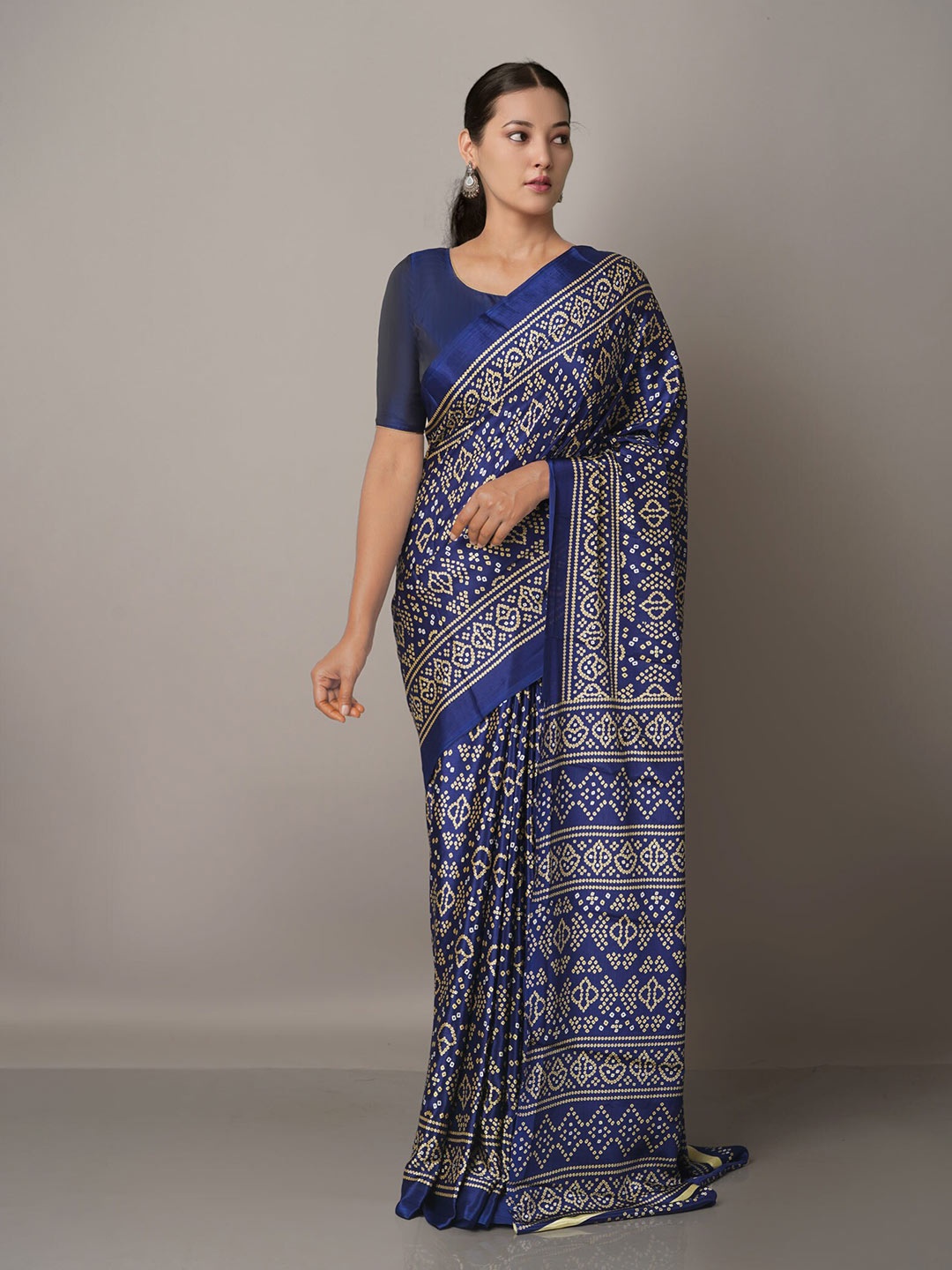 

Unnati Silks Blue & White Bandhani Silk Blend Bandhani Saree