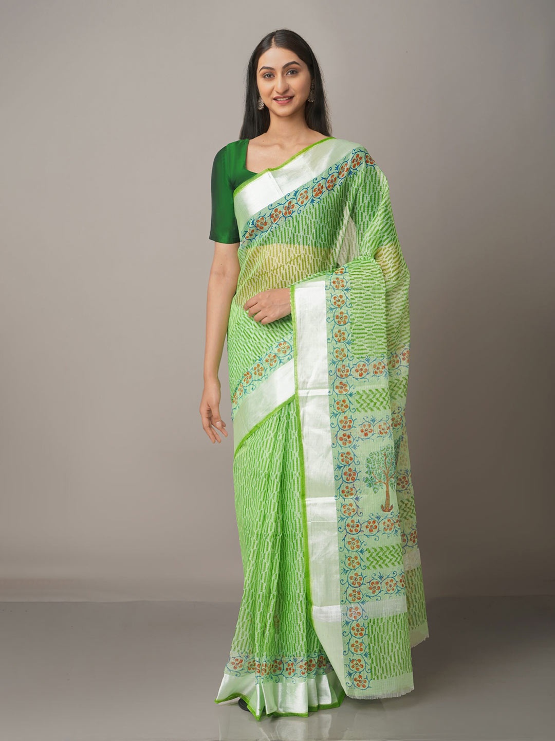 

Unnati Silks Green & Brown Ethnic Motifs Zari Pure Cotton Kota Saree