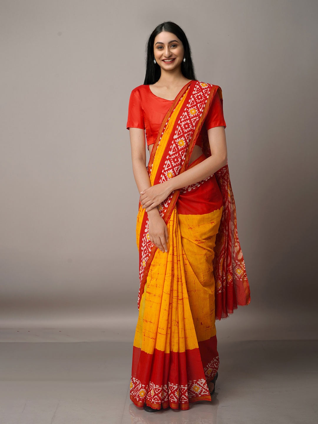 

Unnati Silks Orange & Yellow Batik Zari Silk Cotton Chanderi Saree