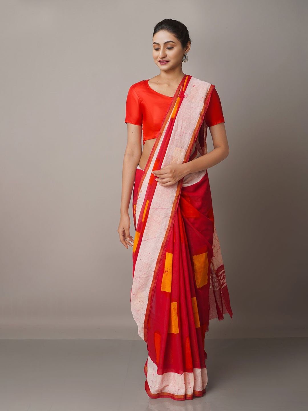 

Unnati Silks Red & Yellow Batik Zari Silk Cotton Chanderi Saree