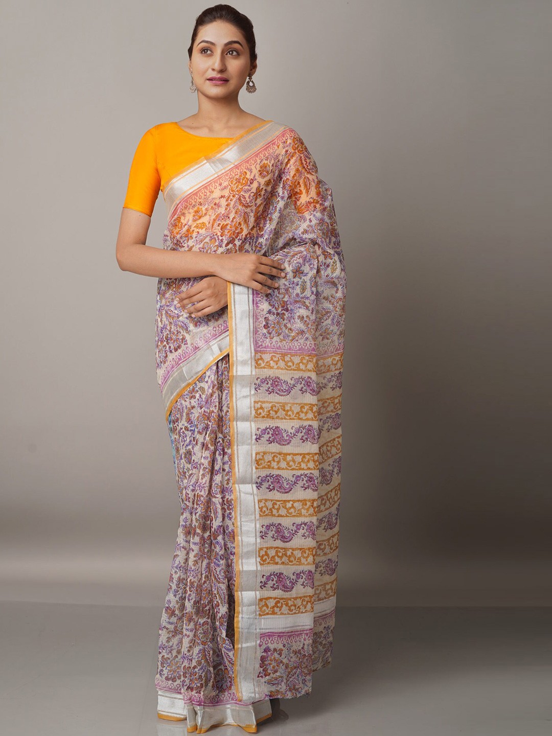 

Unnati Silks Cream-Coloured & Purple Ethnic Motifs Zari Pure Cotton Kota Saree