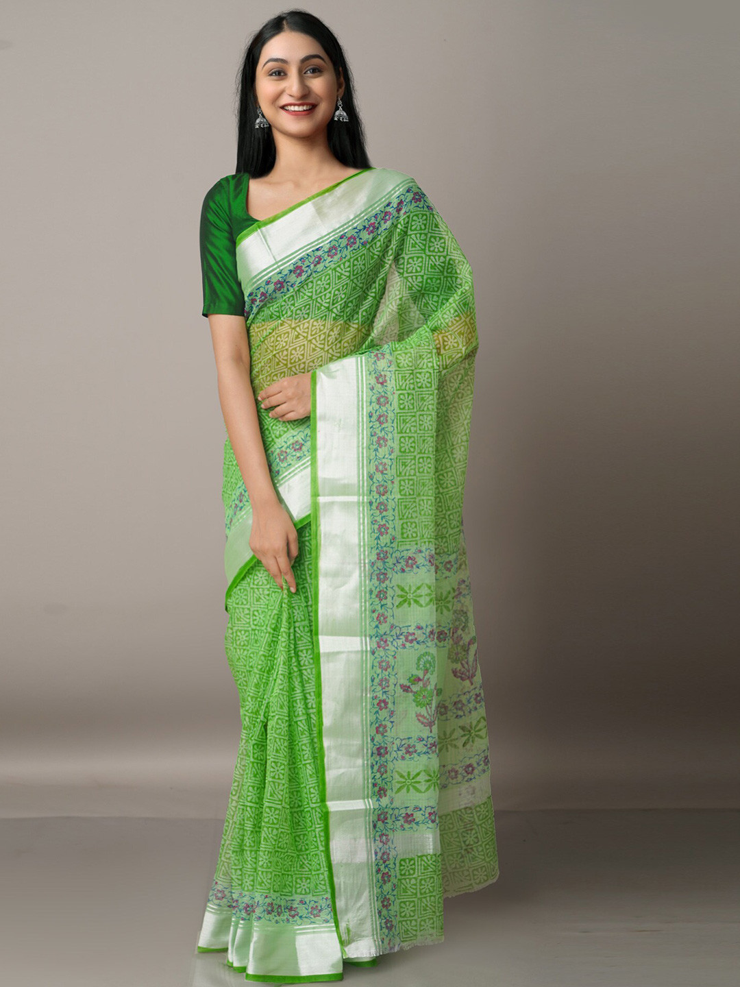 

Unnati Silks Green & Purple Floral Zari Pure Cotton Kota Saree
