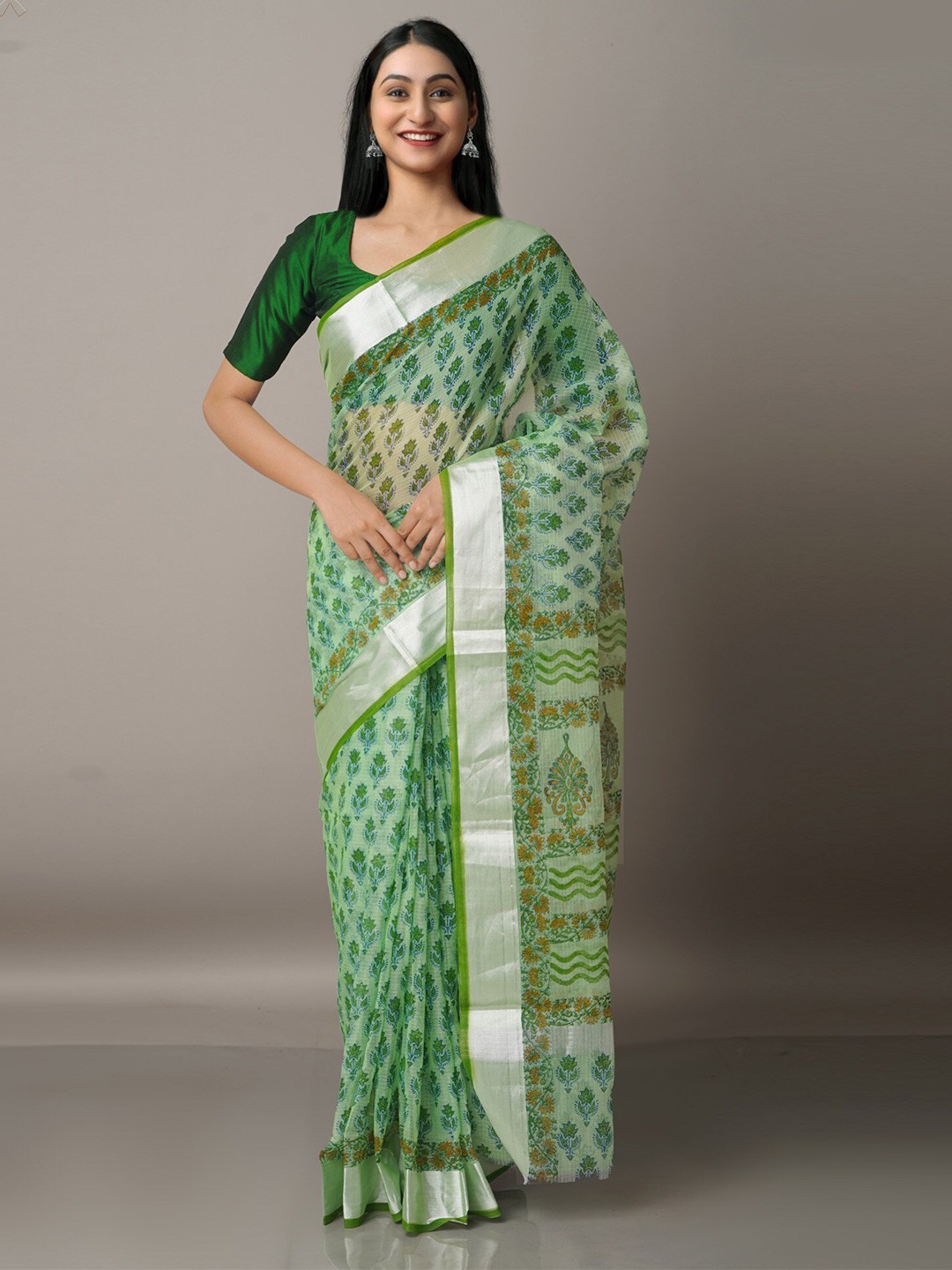 

Unnati Silks Green & Brown Ethnic Motifs Zari Pure Cotton Kota Saree