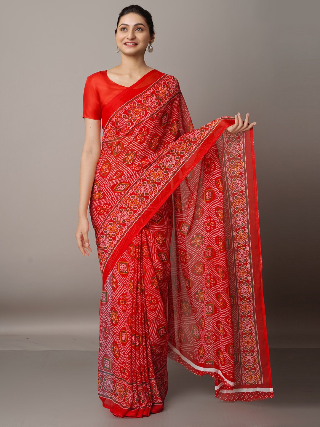 

Unnati Silks Red & White Bandhani Silk Blend Bandhani Saree