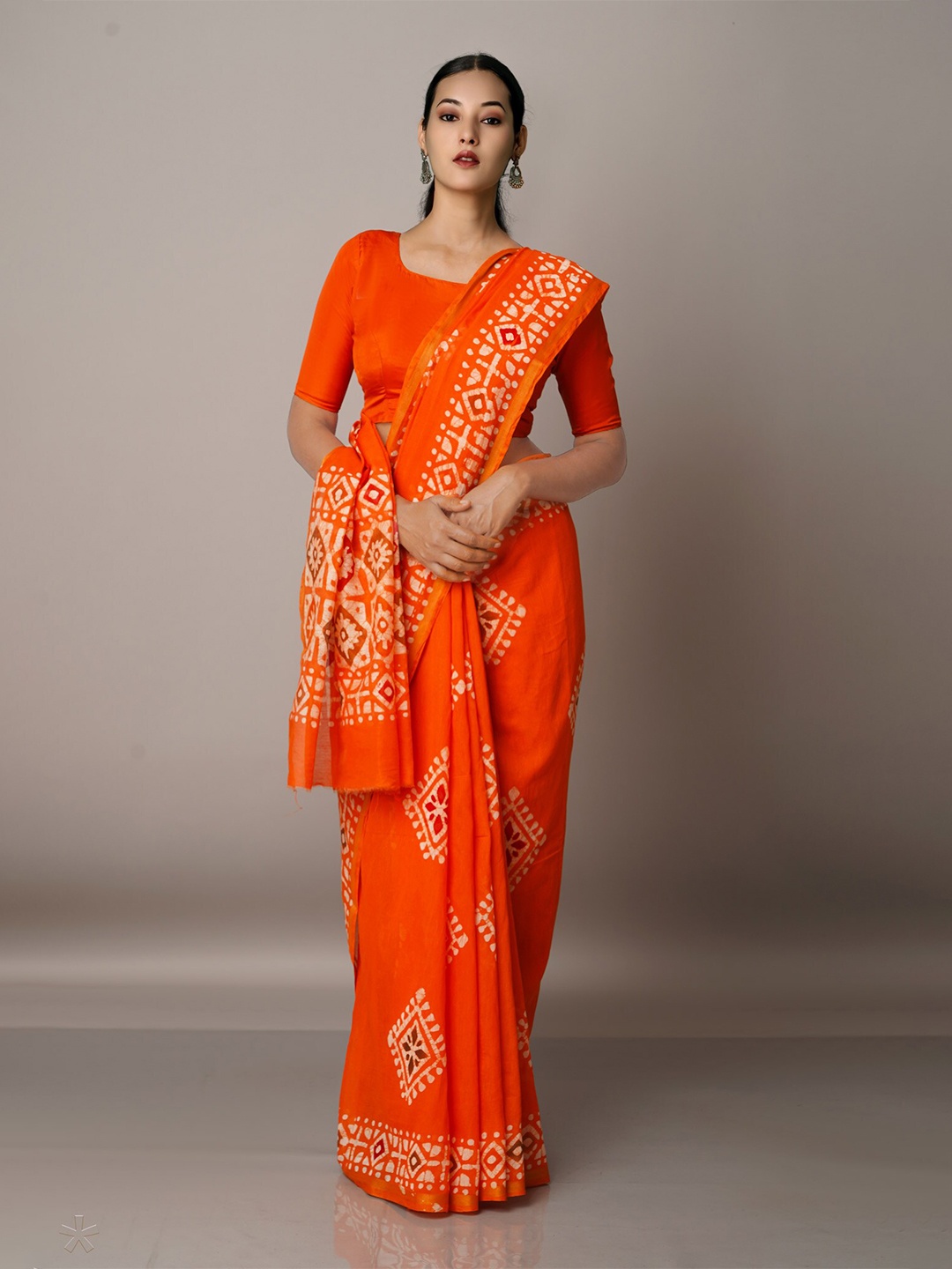 

Unnati Silks Orange & Off White Batik Silk Cotton Chanderi Saree