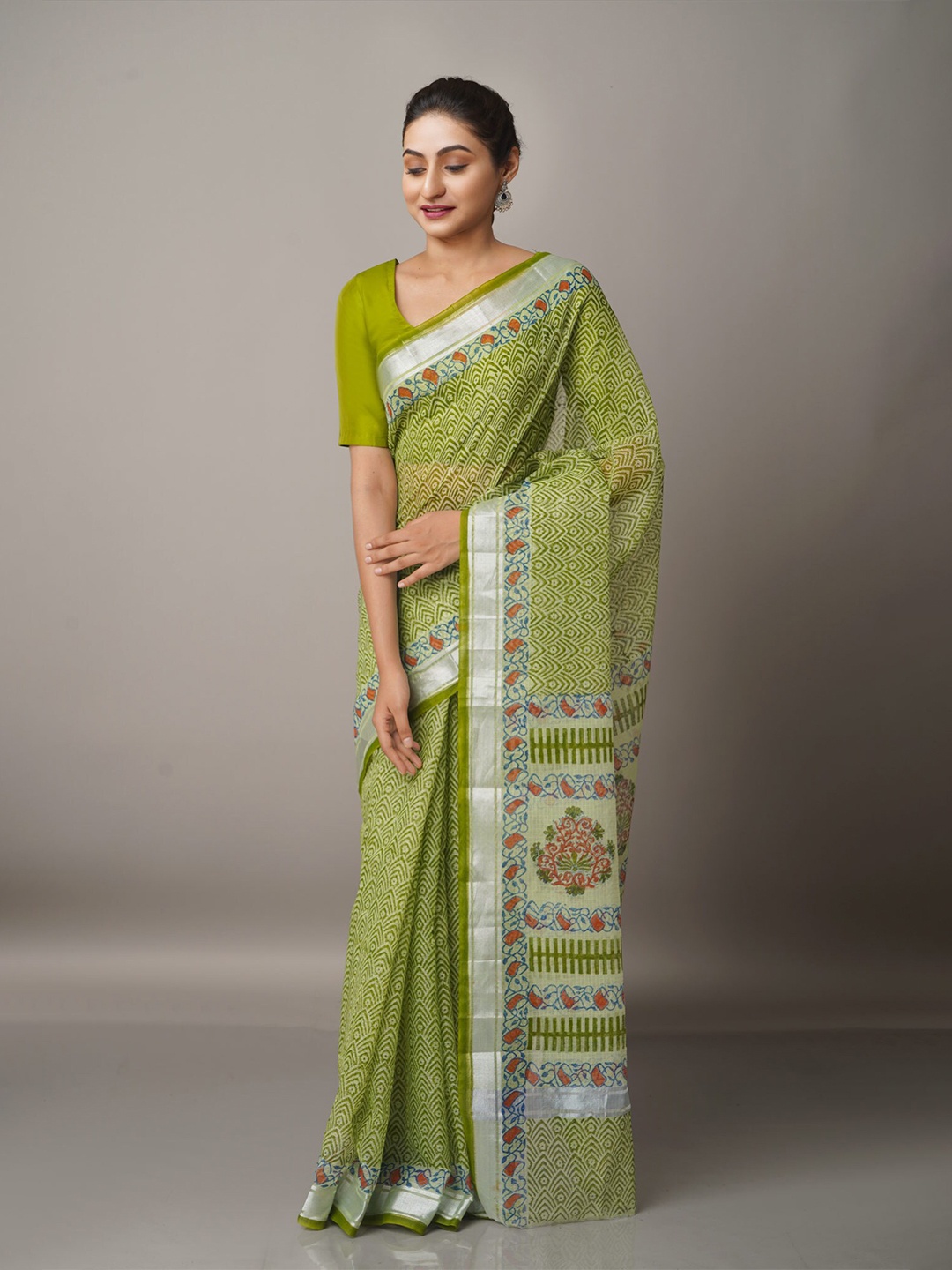 

Unnati Silks Green & Silver-Toned Ethnic Motifs Zari Pure Cotton Kota Saree