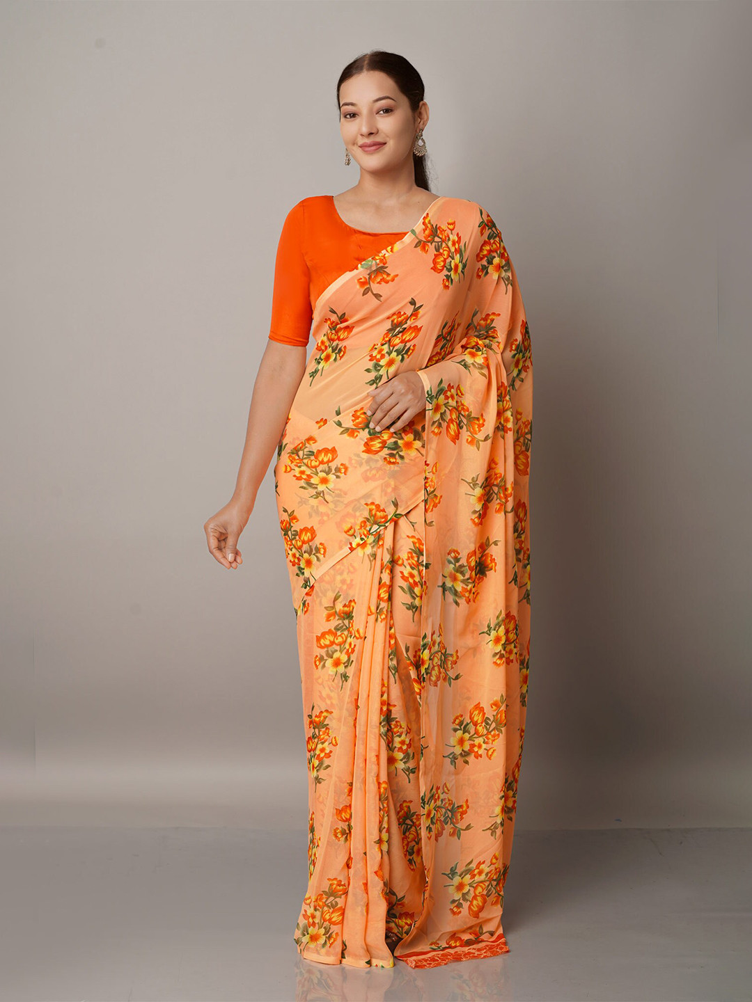 

Unnati Silks Orange & Green Floral Block Print Saree