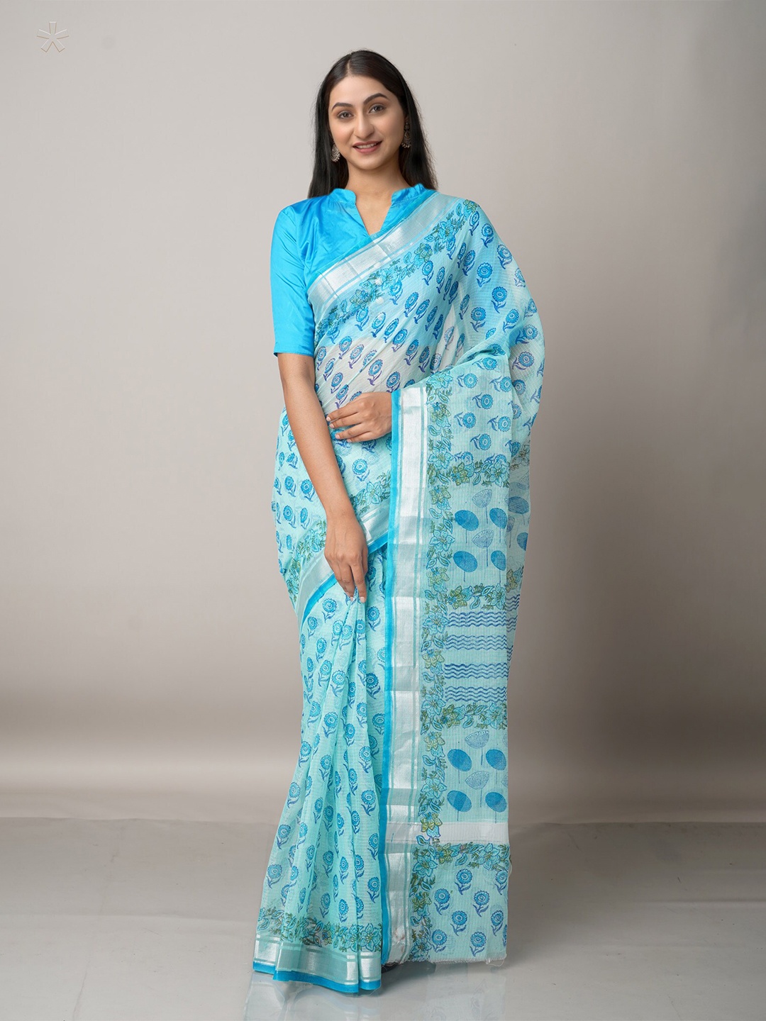 

Unnati Silks Blue & Silver-Toned Ethnic Motifs Zari Pure Cotton Kota Saree