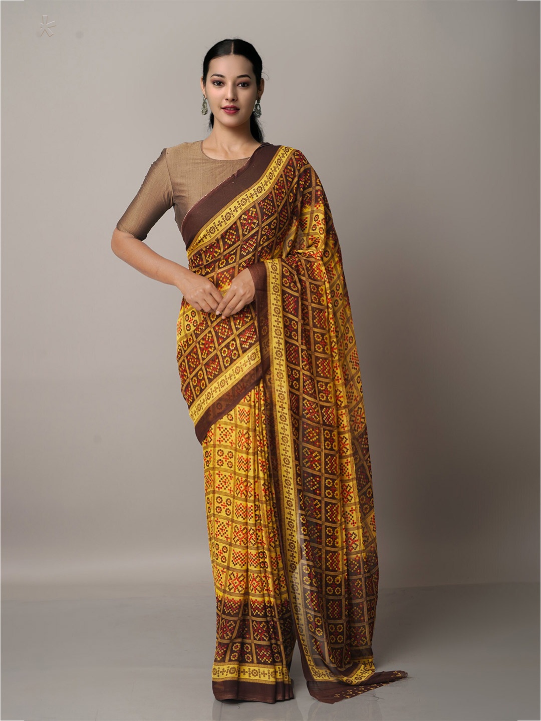 

Unnati Silks Yellow & Brown Bandhani Block Print Saree