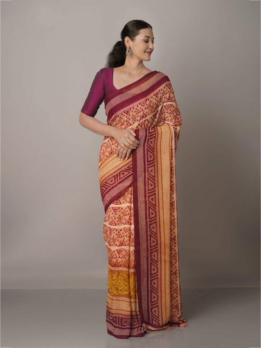 

Unnati Silks Brown & Purple Silk Blend Block Print Saree