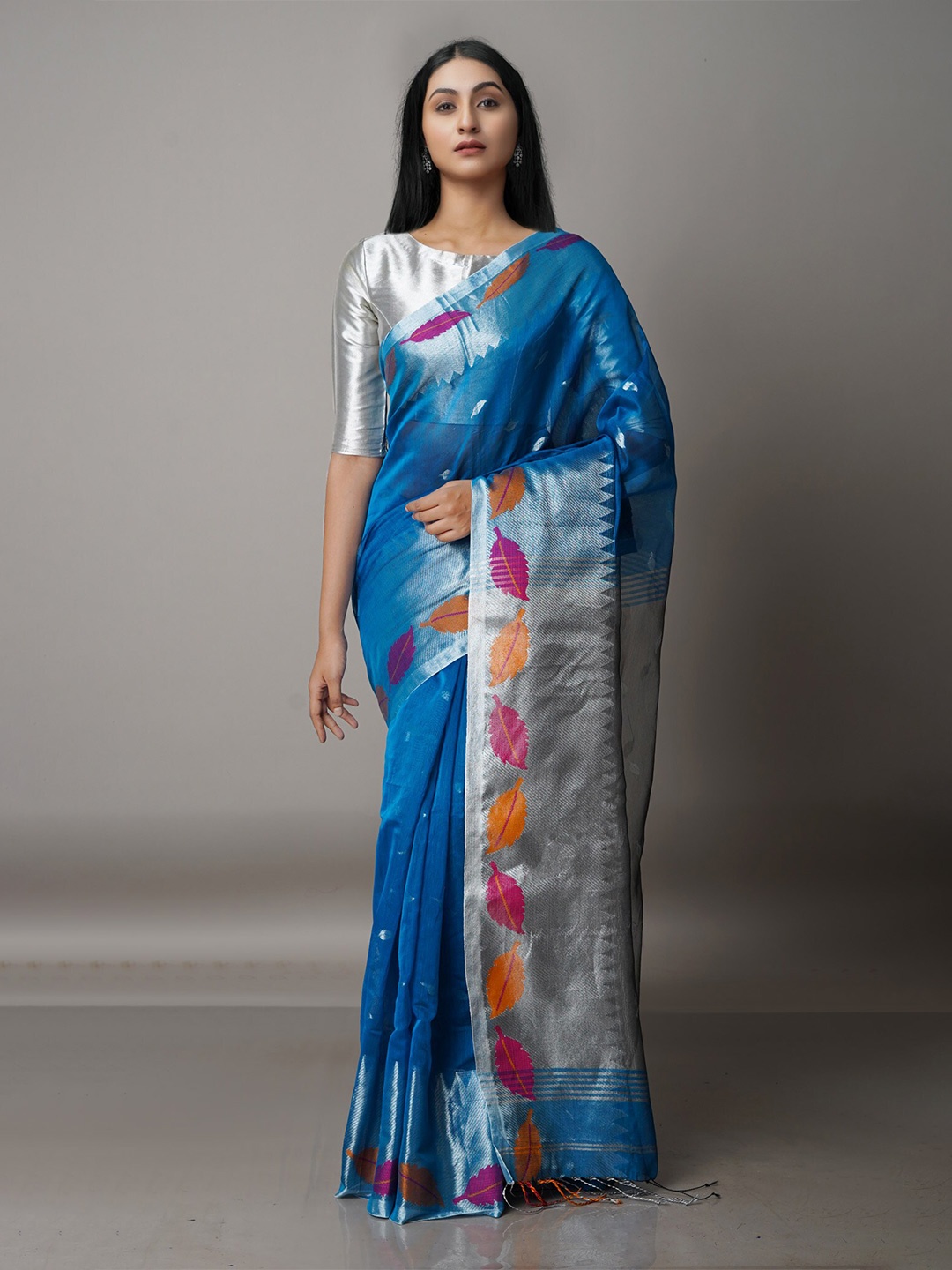 

Unnati Silks Blue & Silver-Toned Woven Design Zari Silk Cotton Jamdani Saree