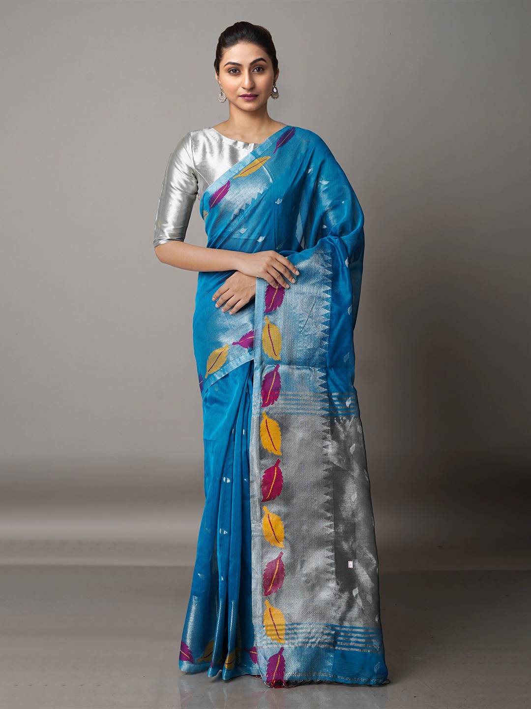 

Unnati Silks Blue & Silver-Toned Woven Design Zari Silk Cotton Jamdani Saree