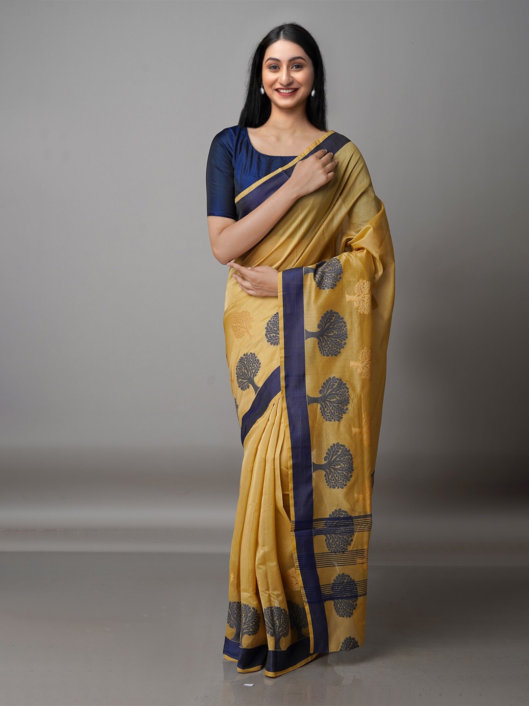 

Unnati Silks Camel Brown & Navy Blue Ethnic Motifs Silk Cotton Bhagalpuri Saree