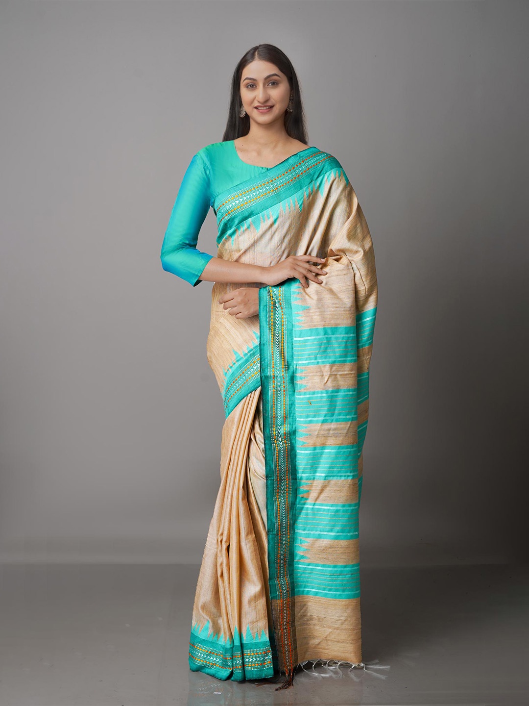 

Unnati Silks Champagne & Blue Woven Design Pure Silk Tussar Saree