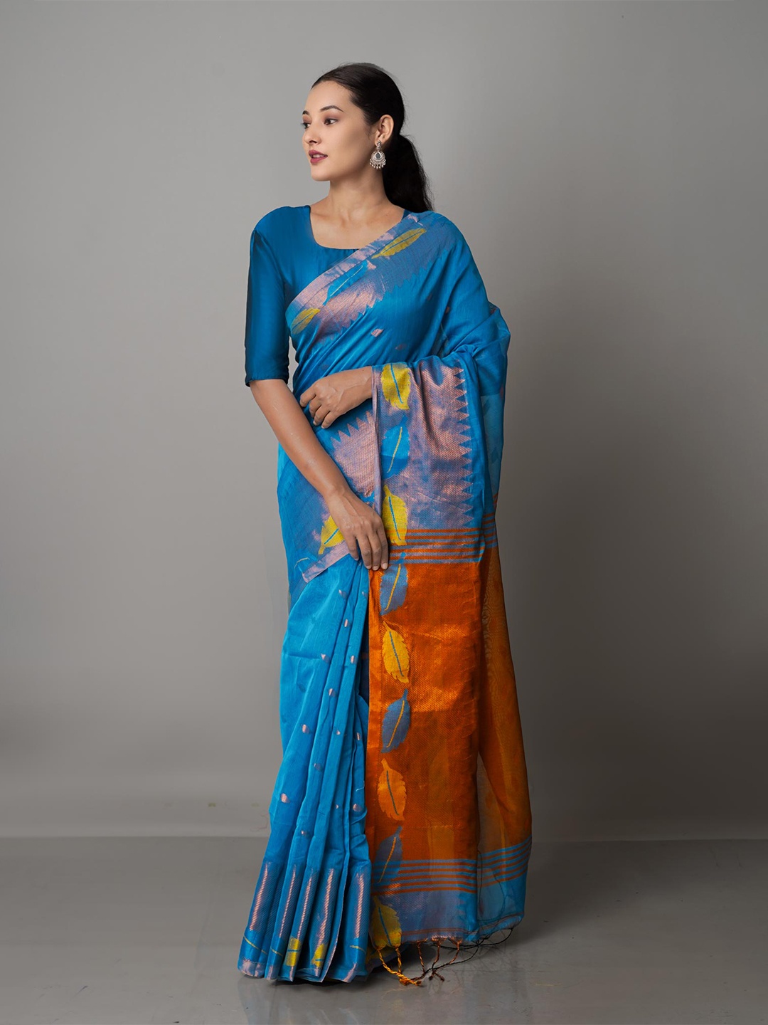 

Unnati Silks Teal & Copper-Toned Woven Design Zari Silk Cotton Jamdani Saree