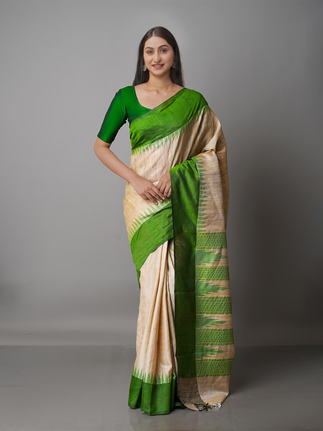 

Unnati Silks Champagne & Green Woven Design Zari Pure Silk Tussar Saree