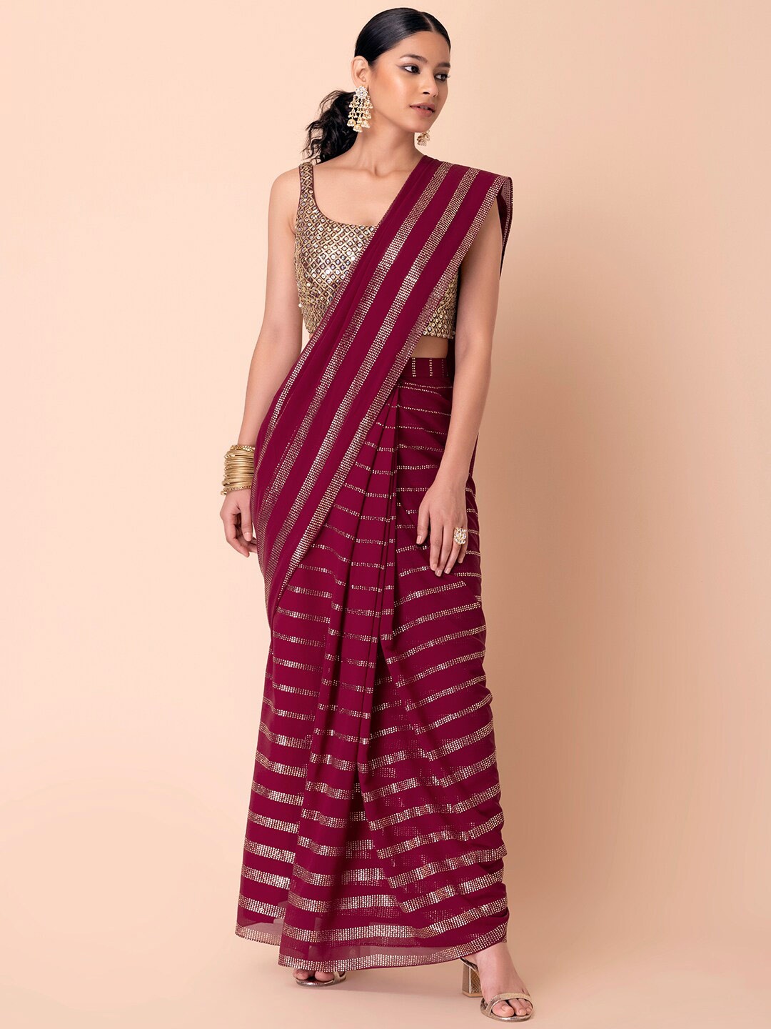 

Indya Luxe Maroon & Gold Embellished Mukaish Saree With Sequinned Blouse
