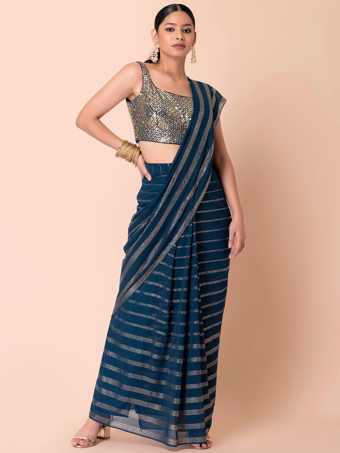 

Indya Luxe Teal Embellished Saree With Sequinned Blouse