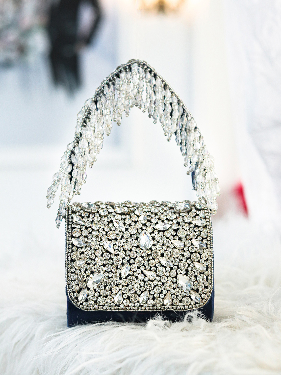 

NR By Nidhi Rathi Blue & White Embroidered Tasselled Purse Clutch