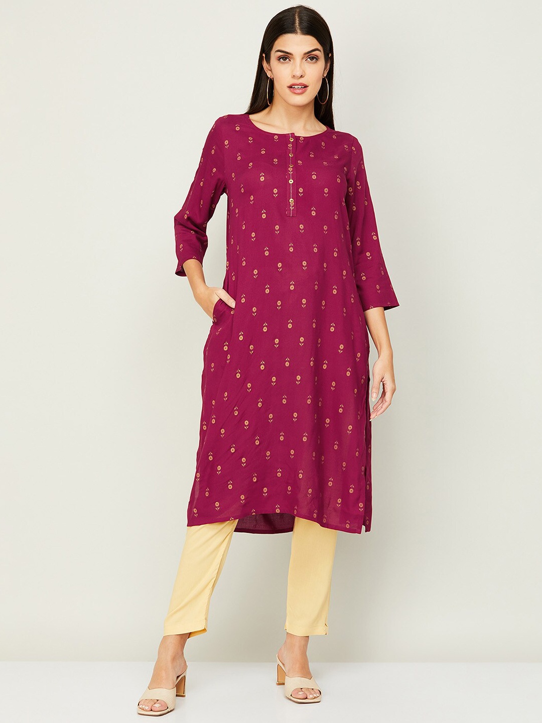 

Melange by Lifestyle Women Maroon & Gold-Toned Floral Printed Floral Kurta