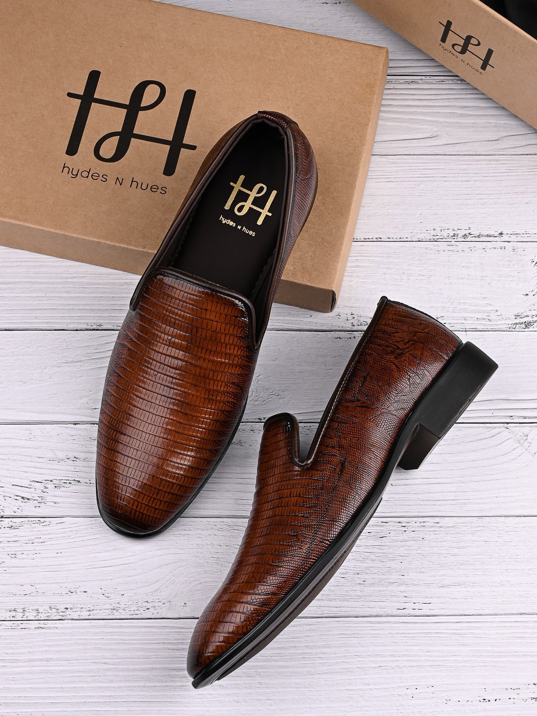 

Hydes N Hues Men Tan Textured Formal Slip-On Shoes