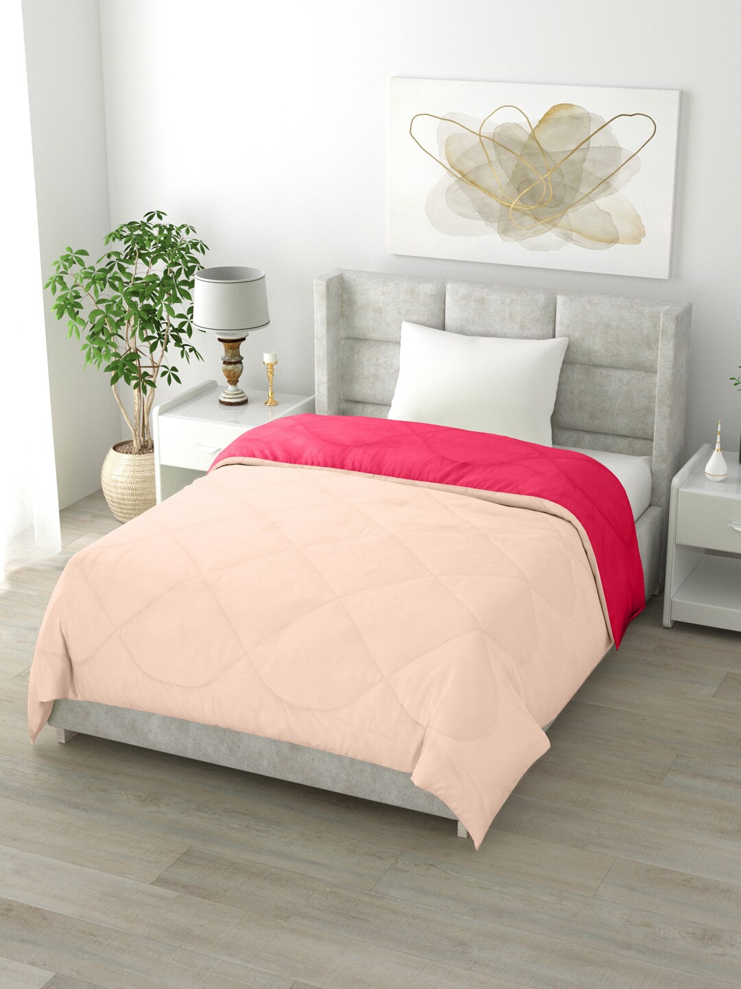 

Clasiko Peach & Pink Solid Mild Winter 200 GSM Reversible Single Bed Comforter