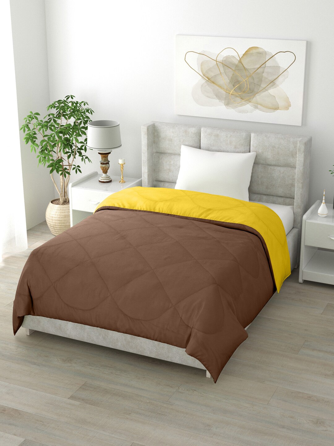 

Clasiko Brown & Yellow Solid Mild Winter 200 GSM Reversible Single Bed Comforter