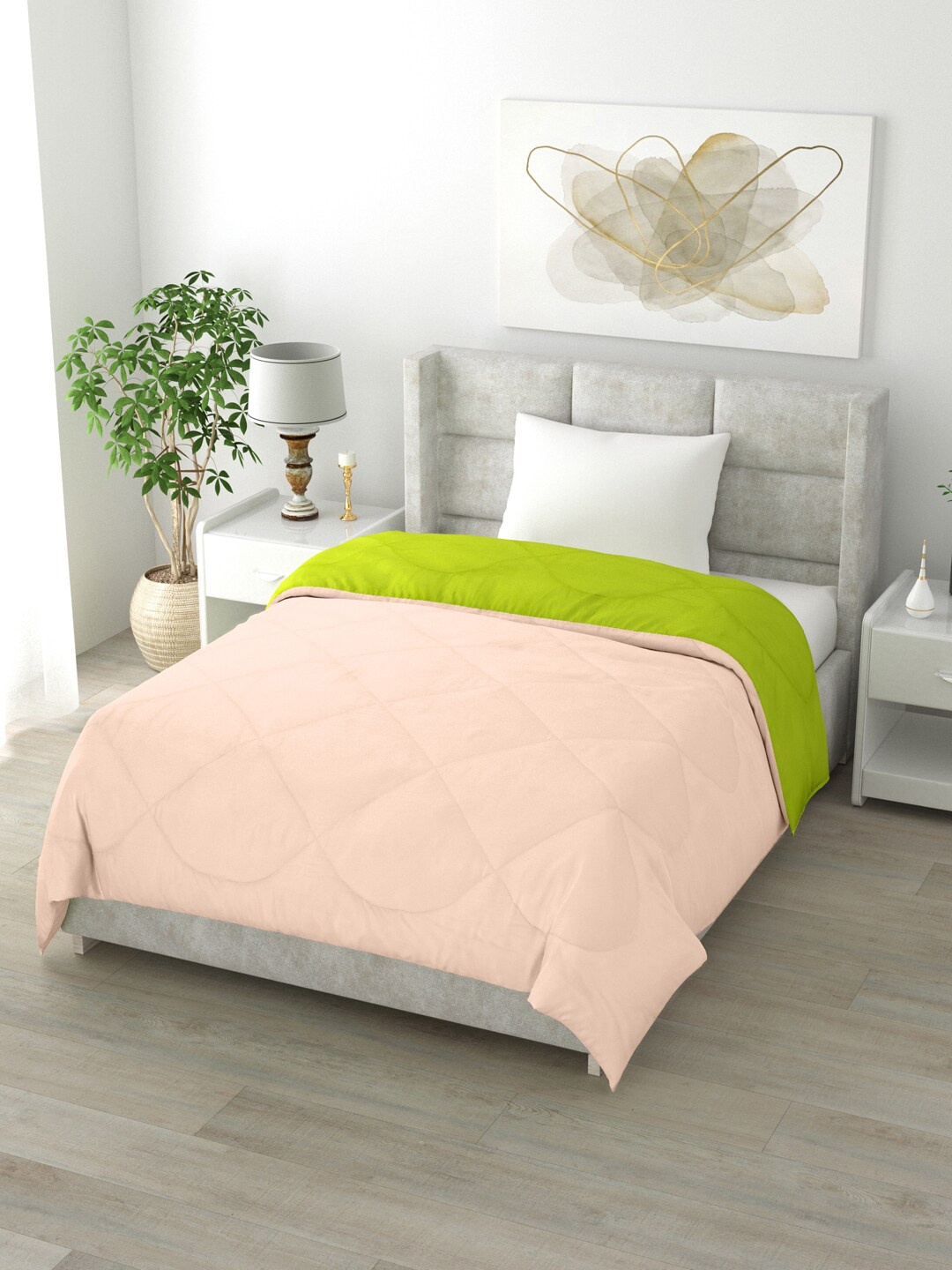 

Clasiko Peach & Green Solid Mild Winter 200 GSM Reversible Single Bed Comforter