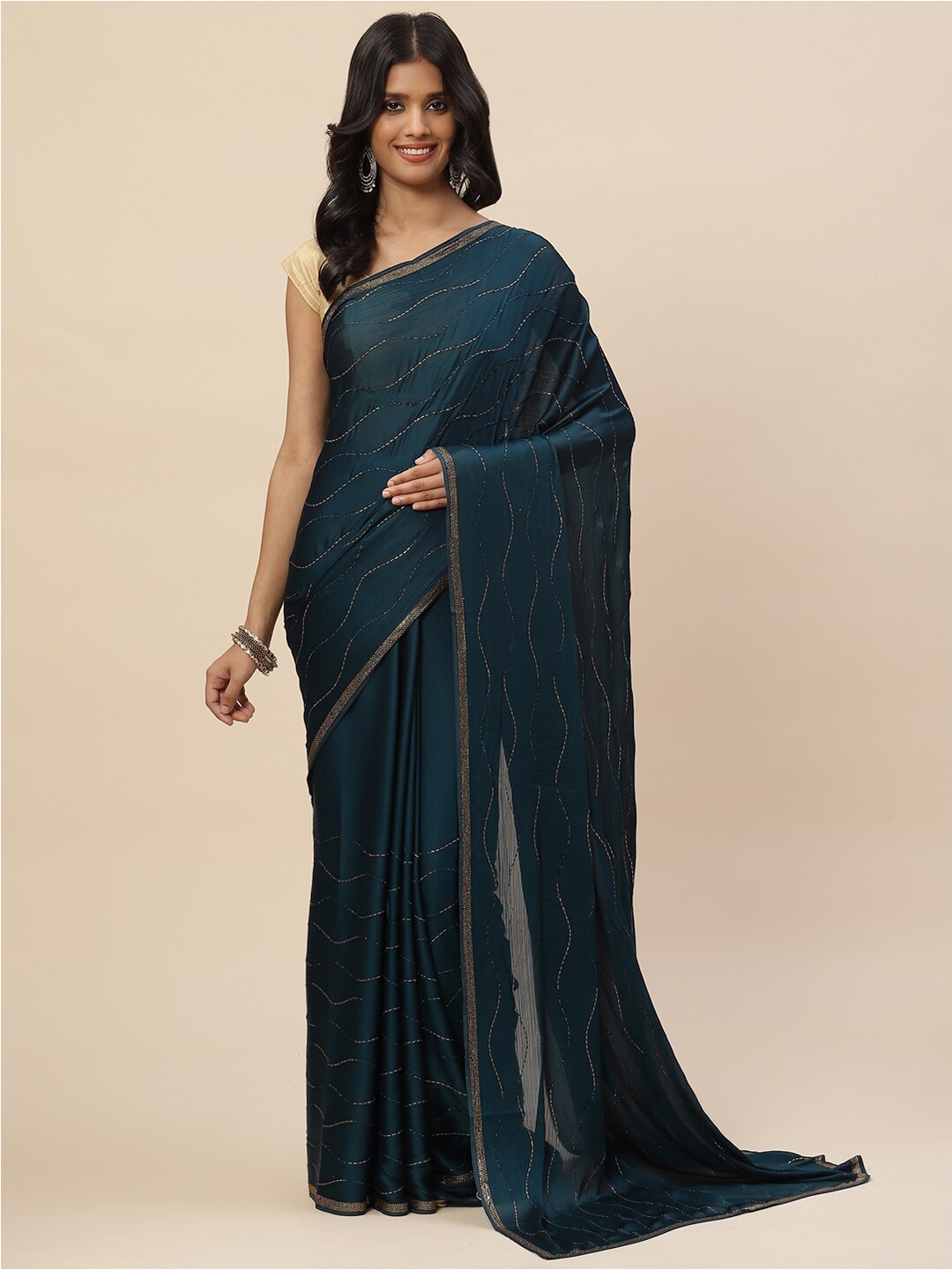 

Meena Bazaar Women Blue & Gold-Toned Embellished Sequinned Saree