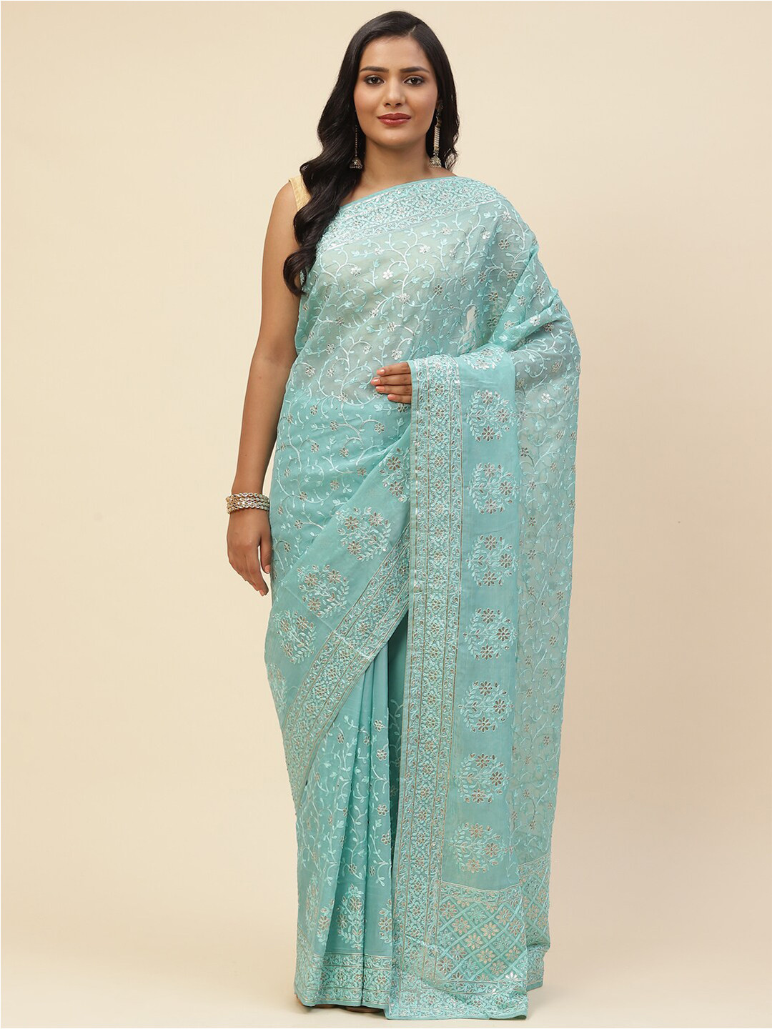 

Meena Bazaar Women Sea Green & Silver-Toned Floral Embroidered Organza Saree