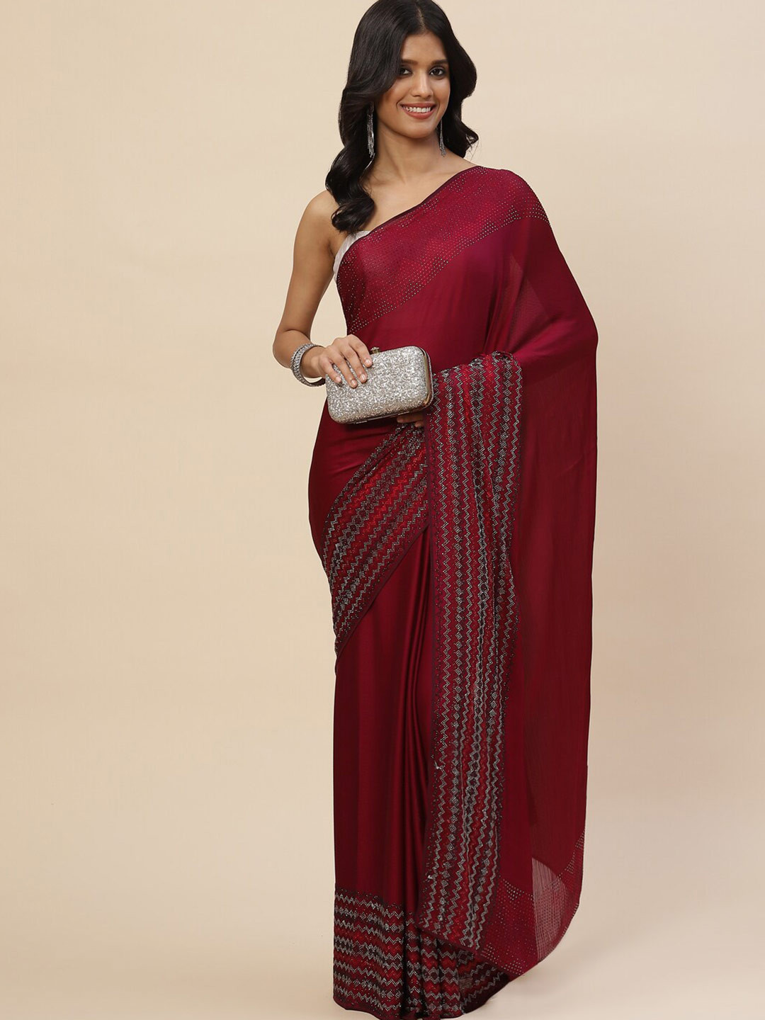 

Meena Bazaar Burgundy & Silver-Toned Embellished Saree