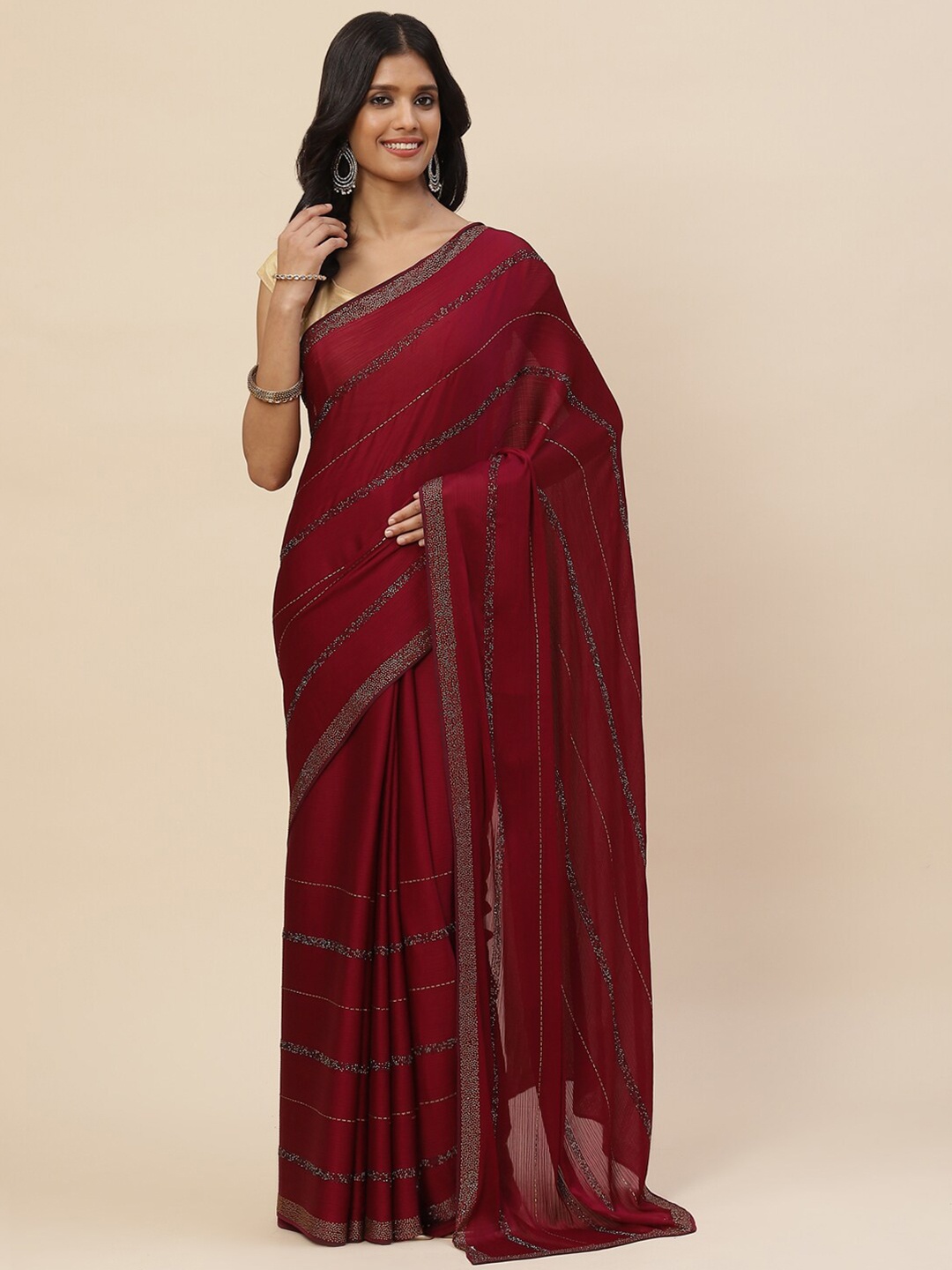 

Meena Bazaar Burgundy & Silver-Toned Embellished Beads and Stones Saree