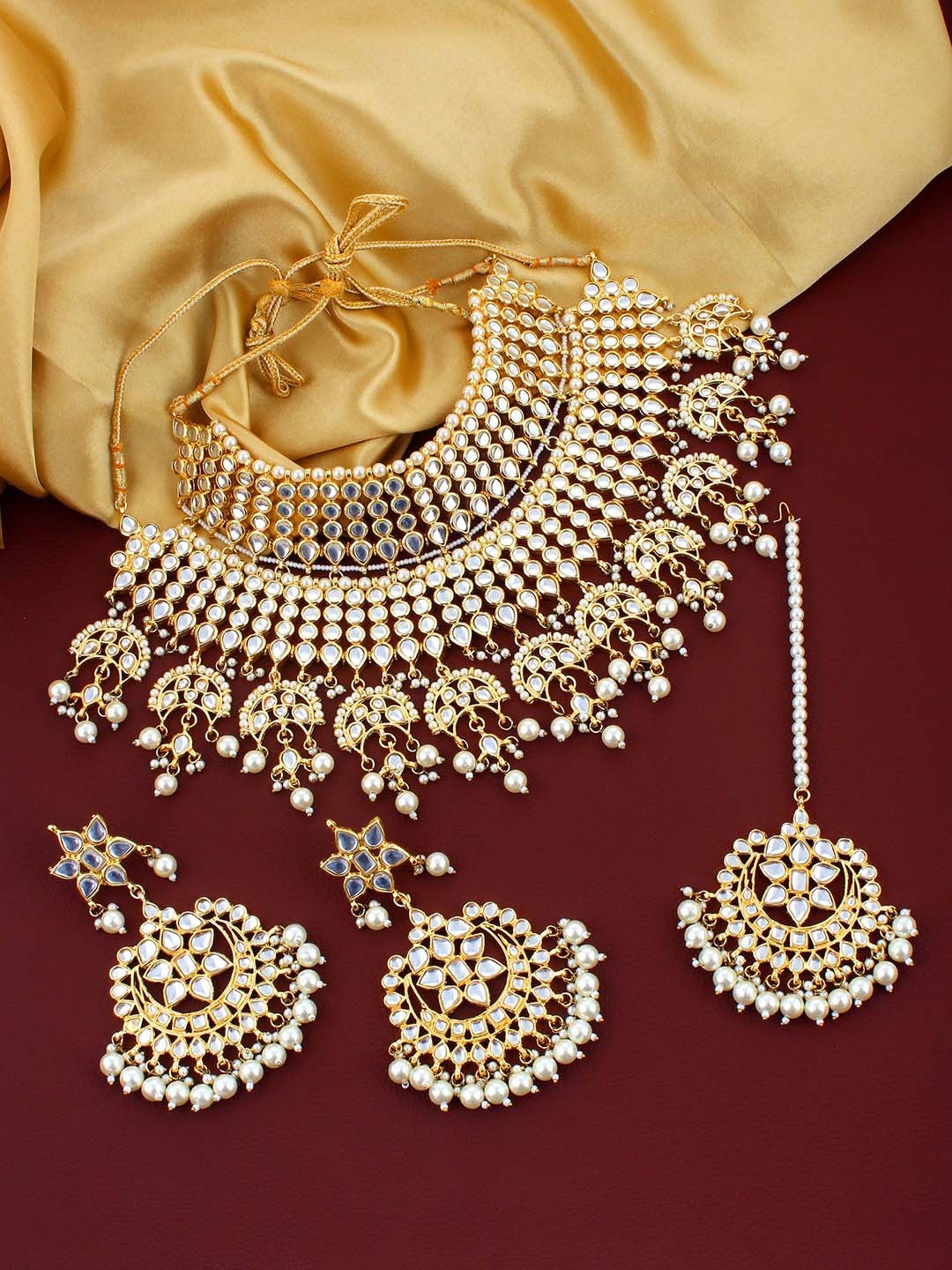 

LUCKY JEWELLERY Gold-Plated & White Kundan Studded Jewellery Set