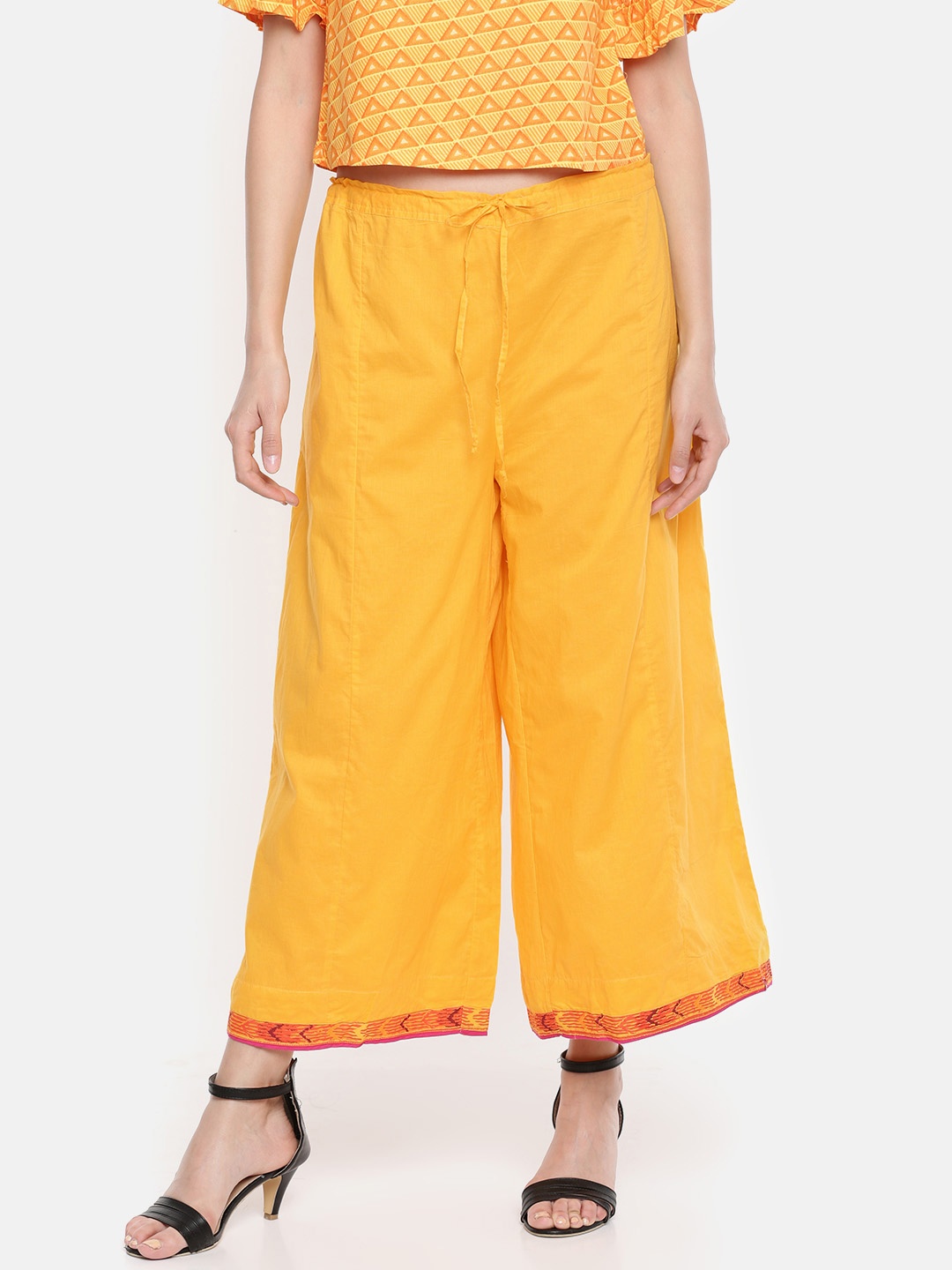 

Biba Women Yellow Solid Flared Palazzos