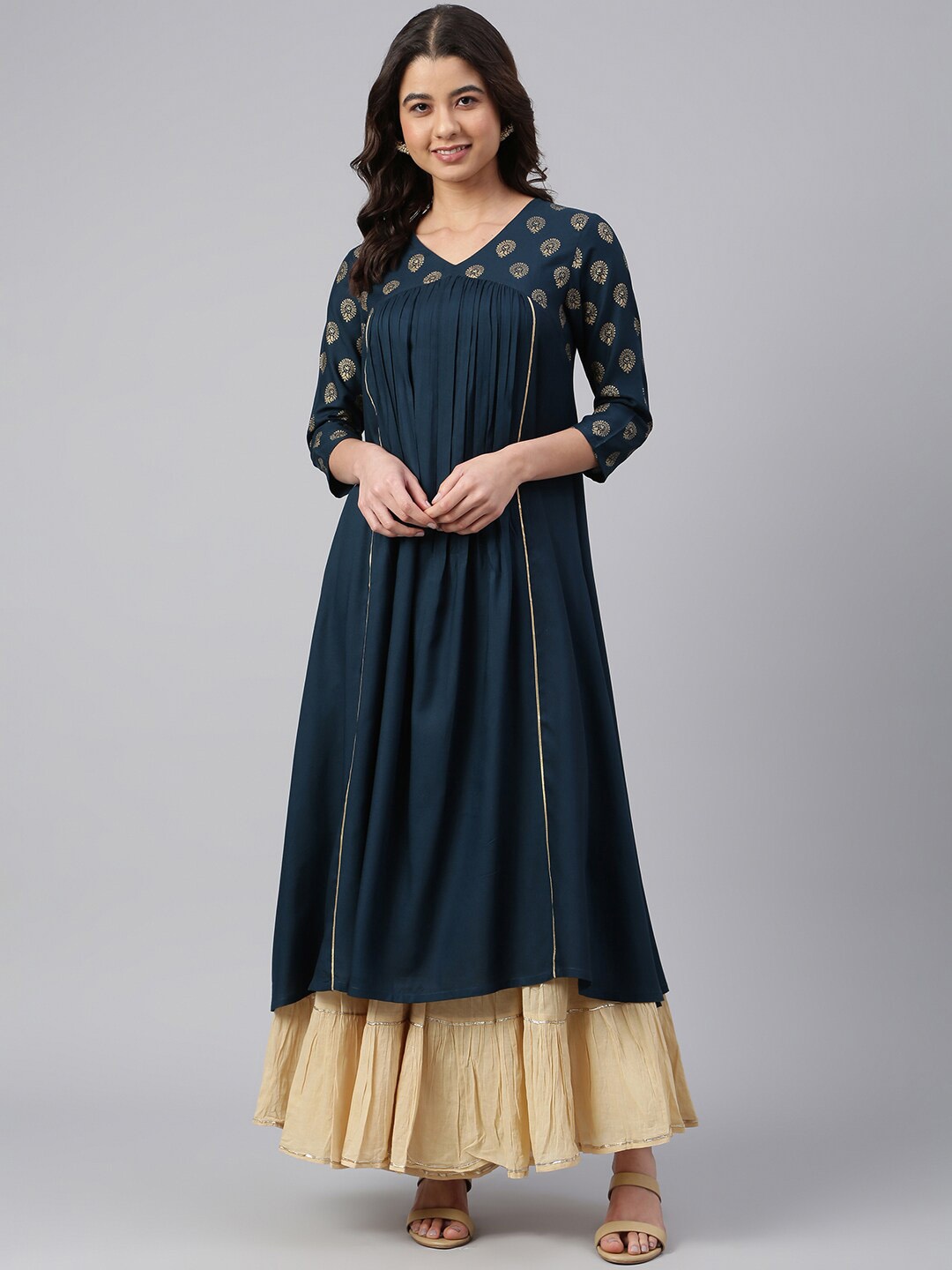 

Janasya Women Teal Rayon Solid A-line Kurta