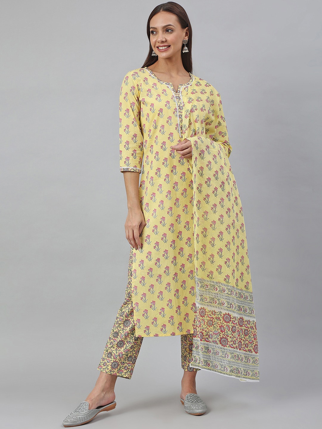 

Janasya Women Yellow Cotton Floral Print Kurta with Trouser and Dupatta